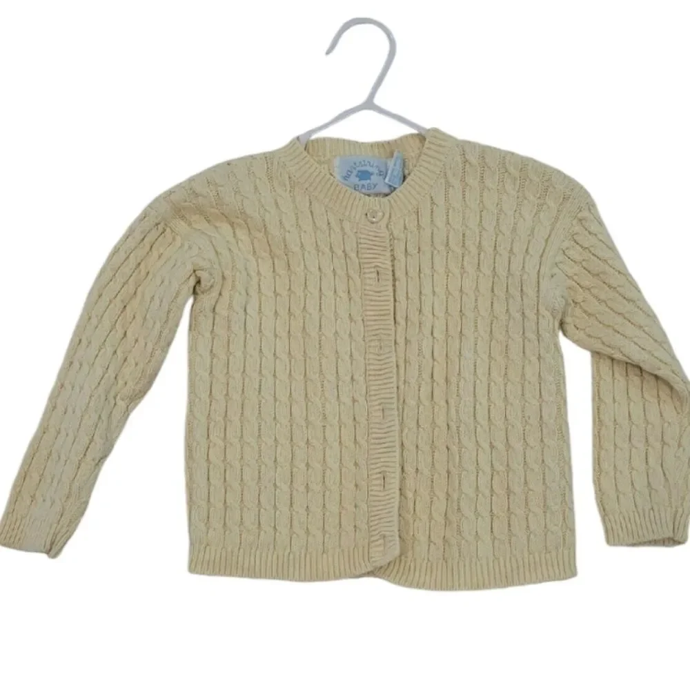 Pale yellow cardigan/ sweater